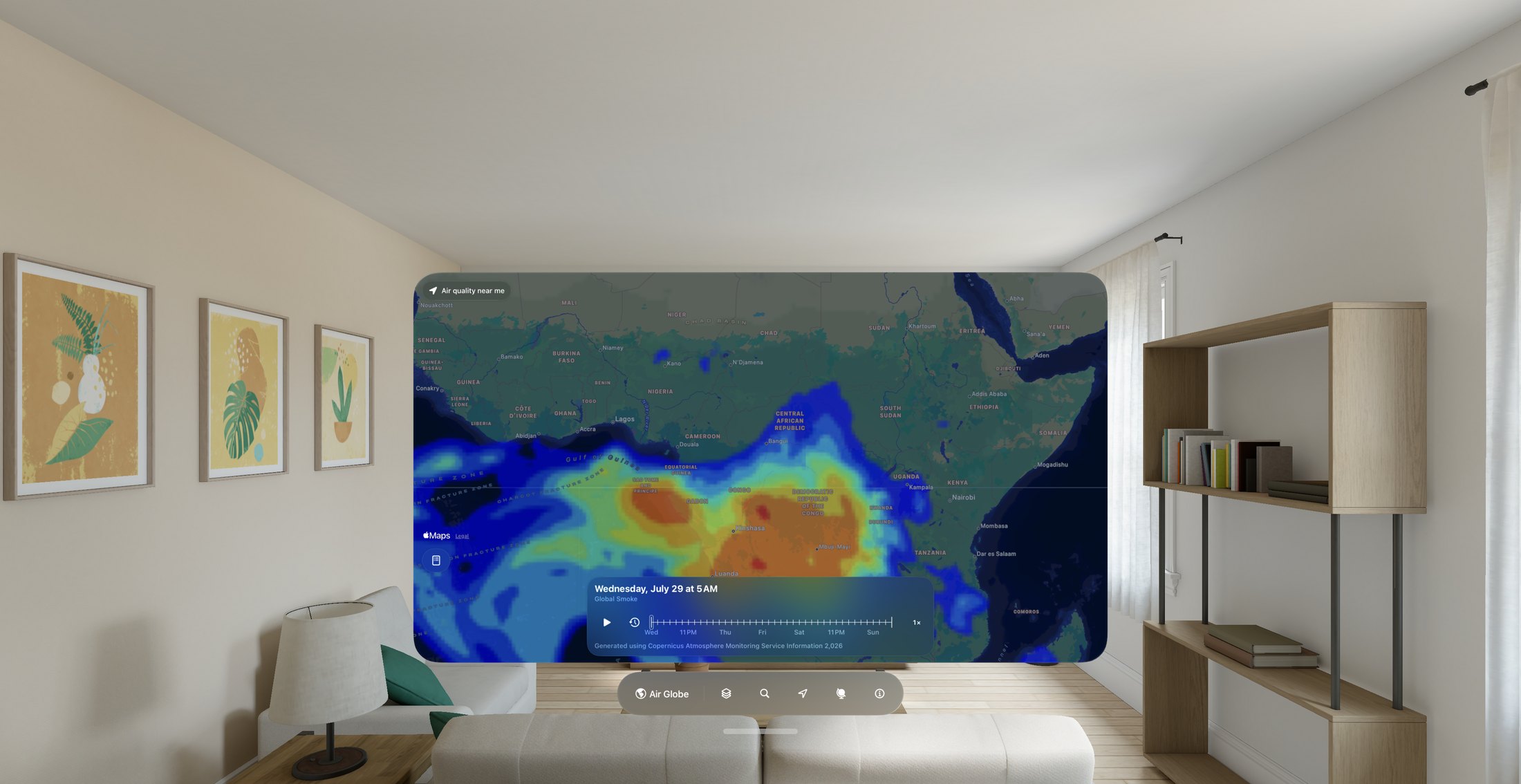 Air Quality Index running on Apple Vision Pro: a large map window floating in a living room showing the global smoke forecast over Central Africa, with the forecast timeline and an ornament toolbar including an Air Globe button.